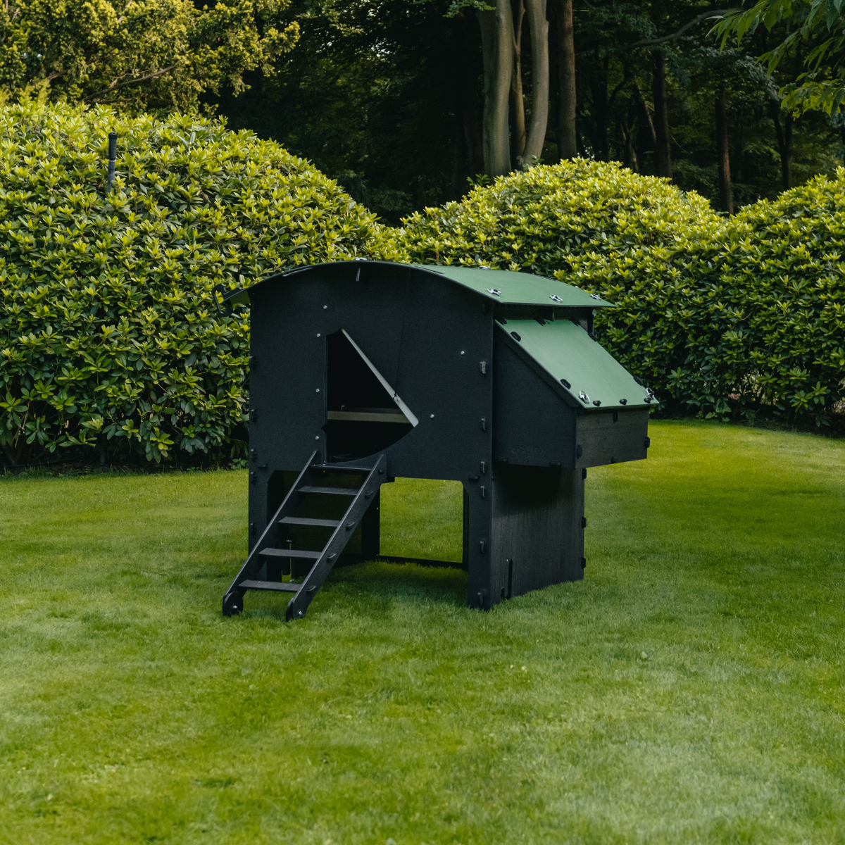 Large raised chicken coop by Nestera made from recycled plastic